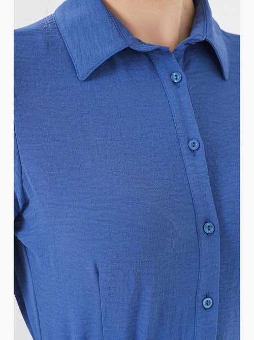 Robe mi-longue boutonnée à col chemise et coupe a avec détails de reliure bdart - Kiabi Robe mi-longue boutonnée à col chemise et coupe a avec détails de reliure bdart - Kiabi