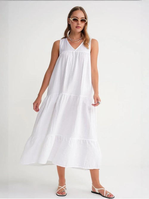 Robe mi-longue en mousseline sans manches à col en v et poches mixray - Kiabi Robe mi-longue en mousseline sans manches à col en v et poches mixray - Kiabi