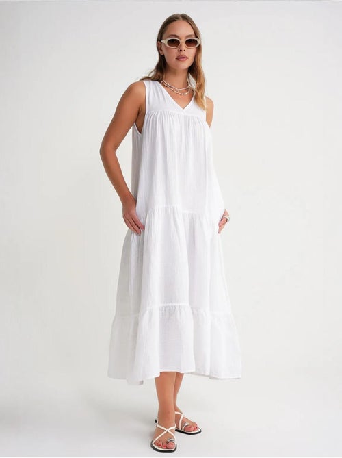 Robe mi-longue en mousseline sans manches à col en v et poches mixray - Kiabi Robe mi-longue en mousseline sans manches à col en v et poches mixray - Kiabi