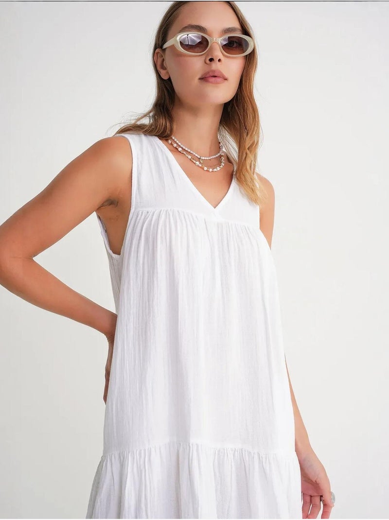 Robe mi-longue en mousseline sans manches à col en v et poches mixray Blanc - Kiabi