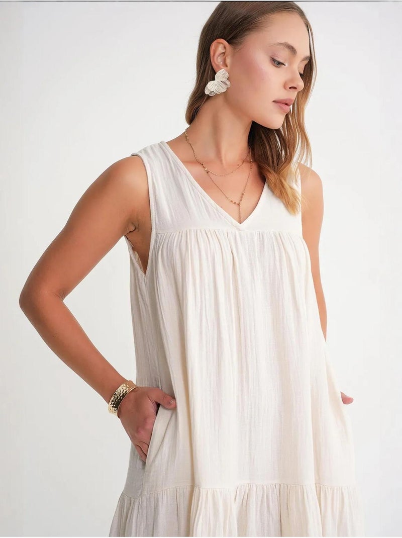 Robe mi-longue en mousseline sans manches à col en v et poches mixray Ivoire - Kiabi