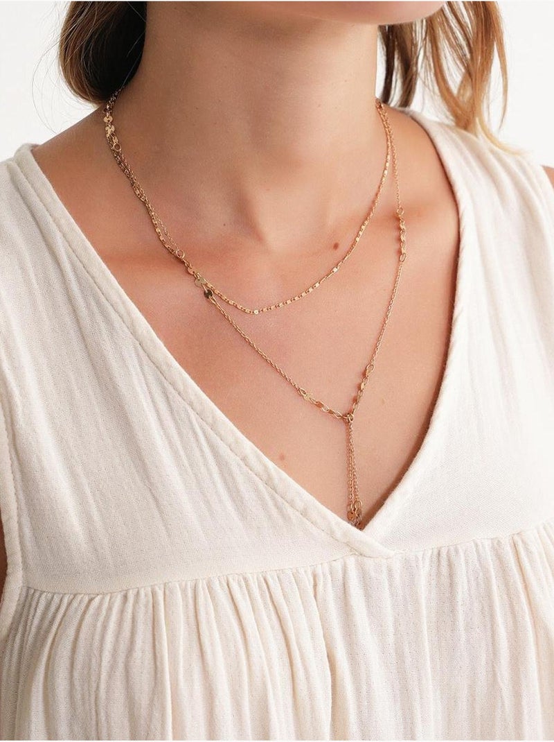 Robe mi-longue en mousseline sans manches à col en v et poches mixray Ivoire - Kiabi