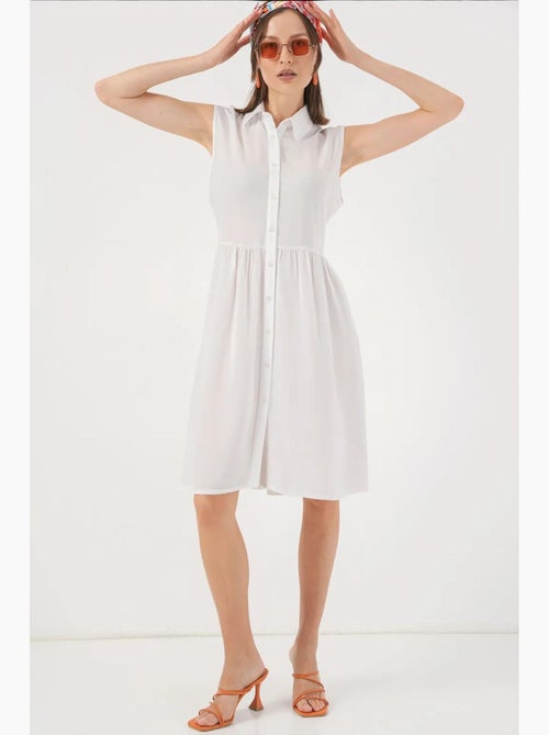 Robe midi boutonnée sans manches avec col chemise bdart - Kiabi Robe midi boutonnée sans manches avec col chemise bdart - Kiabi