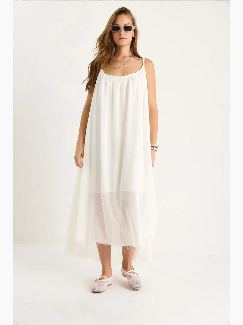 Robe midi en mousseline unie à fines bretelles et ourlet transparent lucci Blanc - Kiabi