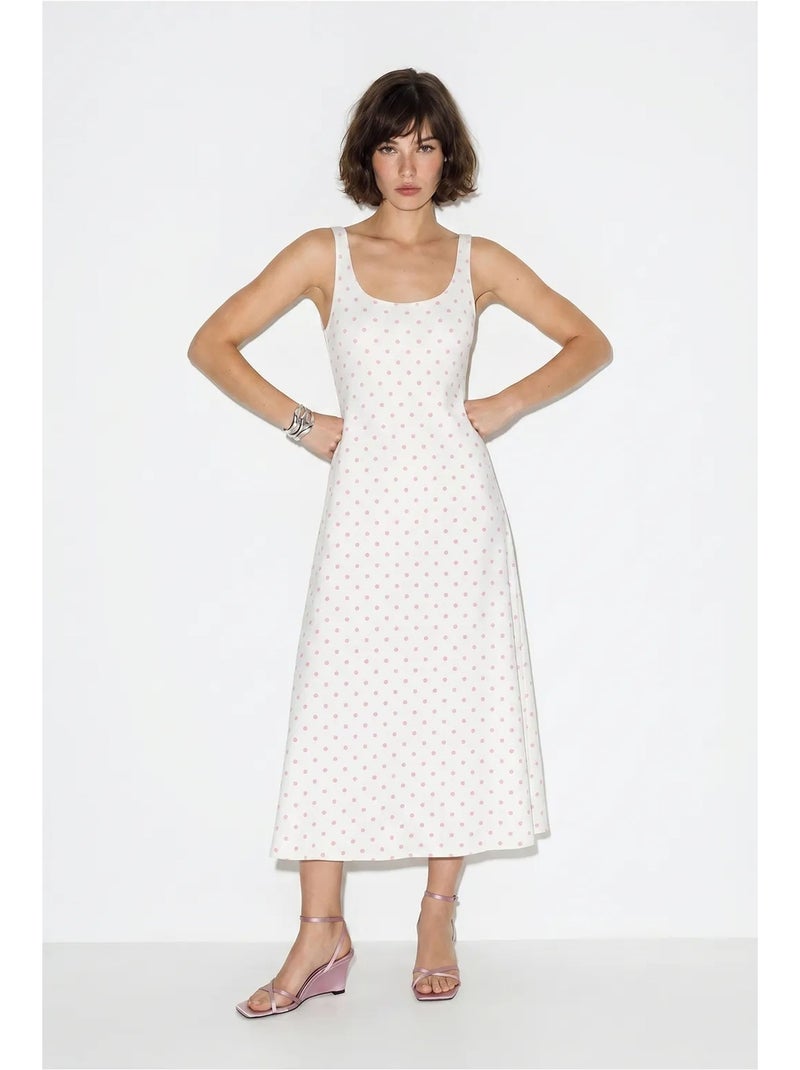 Robe midi sans manches à pois avec lien lucci Blanc - Kiabi