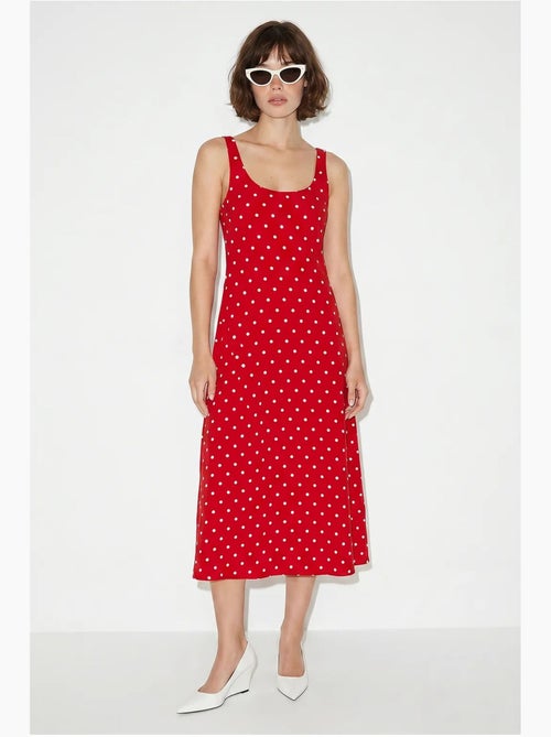 Robe midi sans manches à pois avec lien lucci - Kiabi Robe midi sans manches à pois avec lien lucci - Kiabi