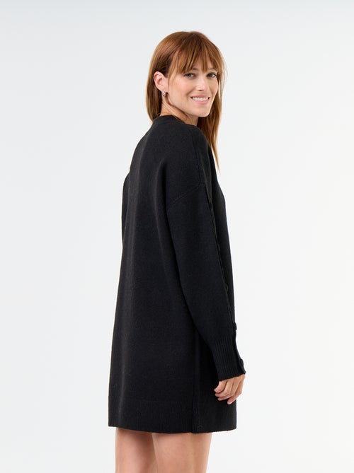 Robe pull courte avec manches boutonnées - Kiabi Robe pull courte avec manches boutonnées - Kiabi