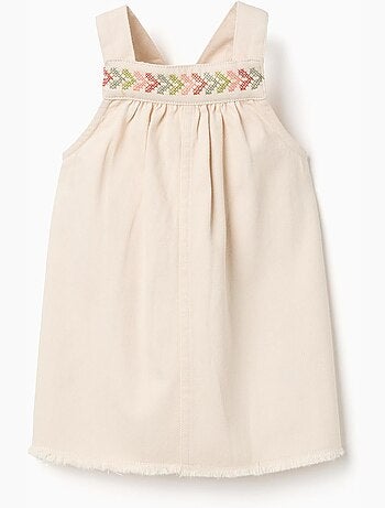 Robe salopette en sergé avec broderie