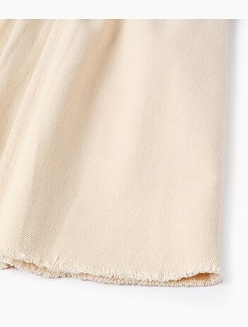 Robe salopette en sergé avec broderie