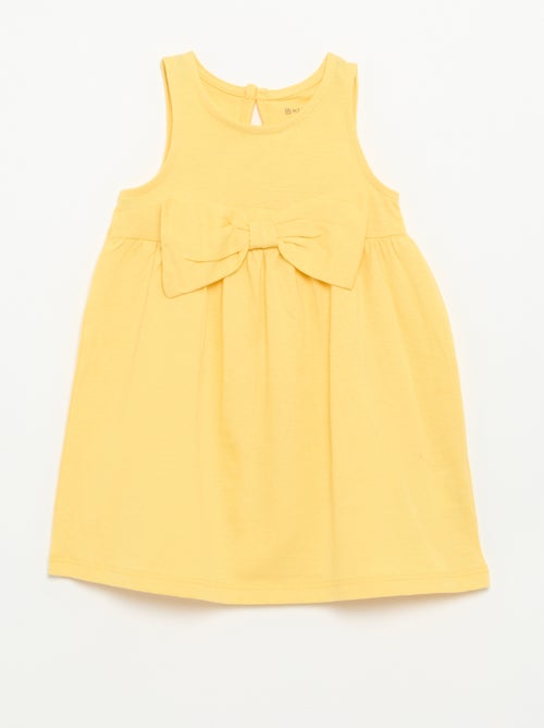Robe unie sans manches avec nœud fantaisie - Kiabi Robe unie sans manches avec nœud fantaisie - Kiabi