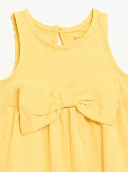 Robe unie sans manches avec nœud fantaisie - Kiabi Robe unie sans manches avec nœud fantaisie - Kiabi