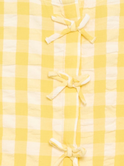 Robe vichy à manches courtes avec nœud + chouchou - Kiabi Robe vichy à manches courtes avec nœud + chouchou - Kiabi