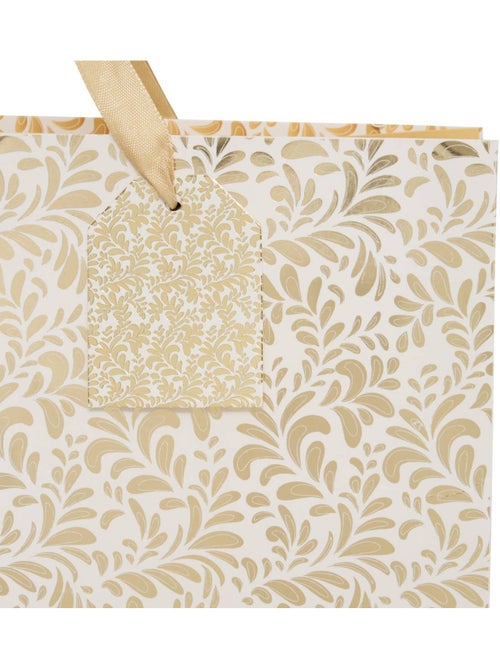 Sac cadeau de noël merveilles grand modèle - Kiabi Sac cadeau de noël merveilles grand modèle - Kiabi