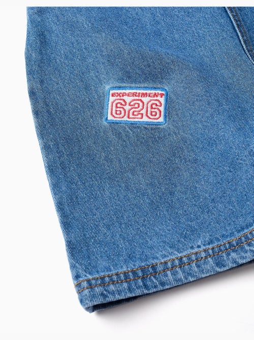 Salopette courte en jean avec broderies stitch - Kiabi Salopette courte en jean avec broderies stitch - Kiabi