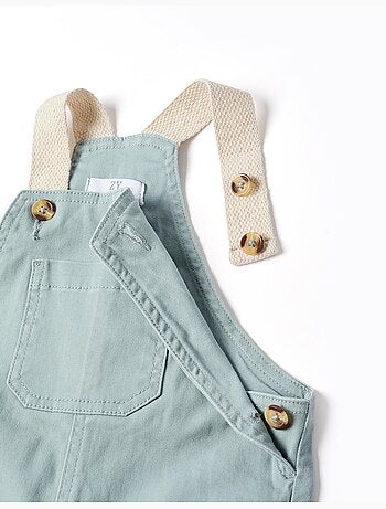 Salopette en sergé à bretelles réglables