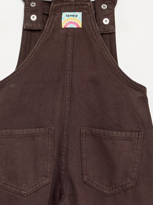Salopette longue en denim avec bretelles volantées - Kiabi Salopette longue en denim avec bretelles volantées - Kiabi