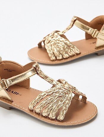 Sandales plates à bride et lanières tressées