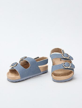 Sandales plates avec bride de maintien à la cheville ajustable par un scratch