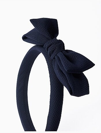 Serre-tête rembourré avec nœud sur le dessus