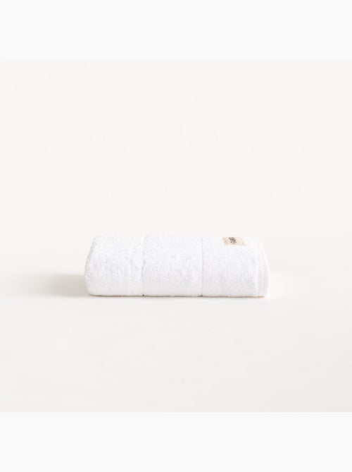 Serviette 100 % coton, éponge 600 g/m², avec boucle de suspension - Gamusi - Kiabi Serviette 100 % coton, éponge 600 g/m², avec boucle de suspension - Gamusi - Kiabi