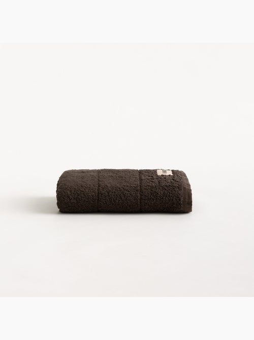 Serviette 100 % coton, éponge 600 g/m², avec boucle de suspension - Gamusi - Kiabi Serviette 100 % coton, éponge 600 g/m², avec boucle de suspension - Gamusi - Kiabi