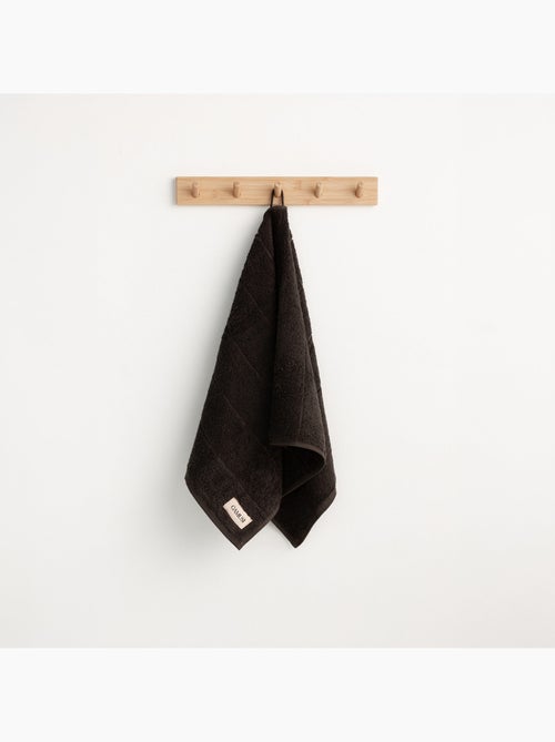 Serviette 100 % coton, éponge 600 g/m², avec boucle de suspension - Gamusi - Kiabi Serviette 100 % coton, éponge 600 g/m², avec boucle de suspension - Gamusi - Kiabi