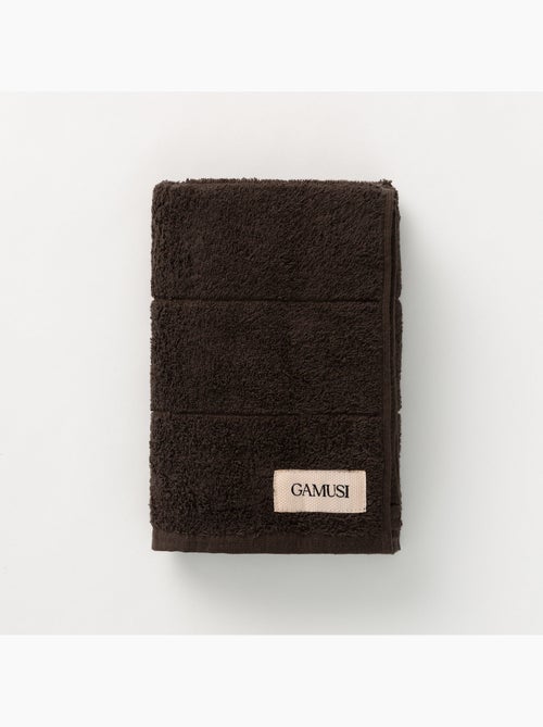 Serviette 100 % coton, éponge 600 g/m², avec boucle de suspension - Gamusi - Kiabi Serviette 100 % coton, éponge 600 g/m², avec boucle de suspension - Gamusi - Kiabi
