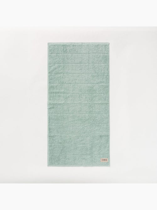 Serviette 100 % coton, éponge 600 g/m², avec boucle de suspension - Gamusi - Kiabi Serviette 100 % coton, éponge 600 g/m², avec boucle de suspension - Gamusi - Kiabi