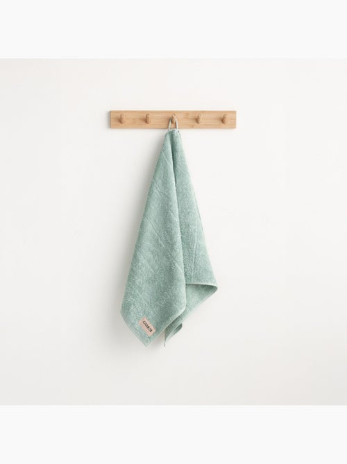 Serviette 100 % coton, éponge 600 g/m², avec boucle de suspension - Gamusi - Kiabi Serviette 100 % coton, éponge 600 g/m², avec boucle de suspension - Gamusi - Kiabi