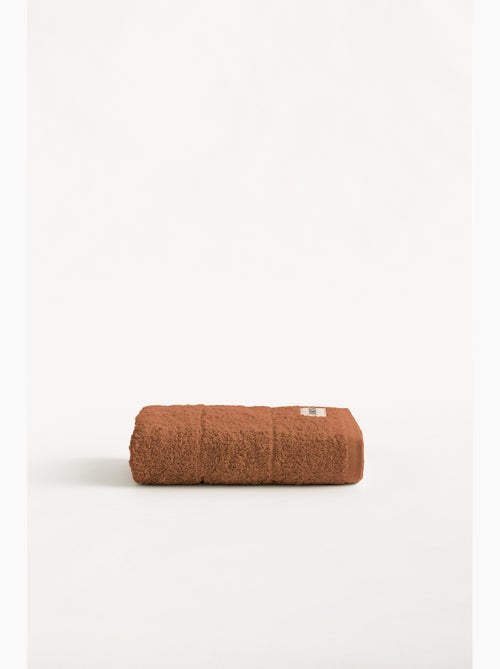 Serviette 100% coton, éponge épaisse, avec boucle - Gamusi - Kiabi Serviette 100% coton, éponge épaisse, avec boucle - Gamusi - Kiabi