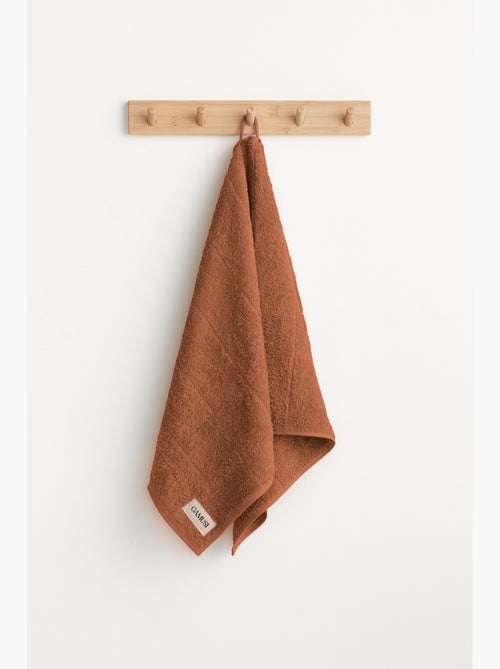 Serviette 100% coton, éponge épaisse, avec boucle - Gamusi - Kiabi Serviette 100% coton, éponge épaisse, avec boucle - Gamusi - Kiabi