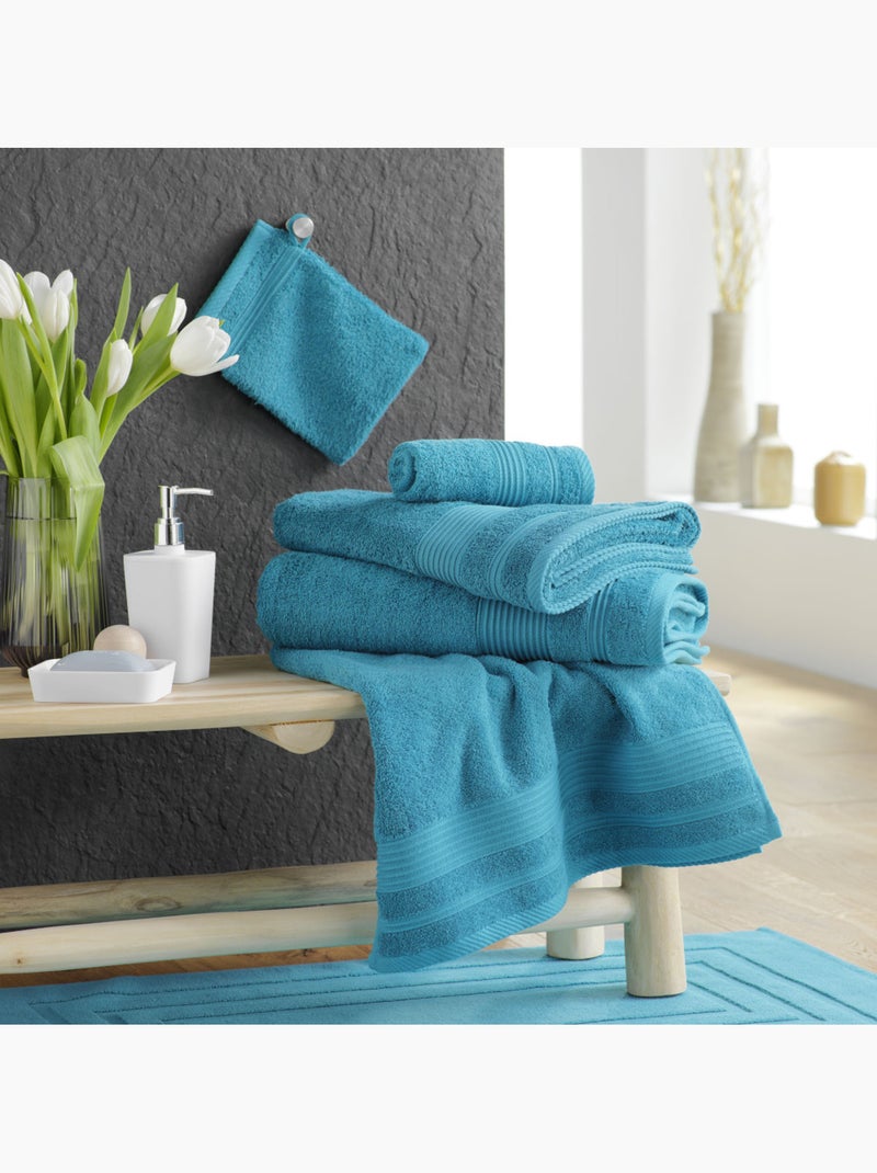 Serviette de toilette éponge unie tendresse Bleu paon - Kiabi