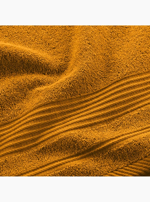 Serviette de toilette éponge unie tendresse - Kiabi