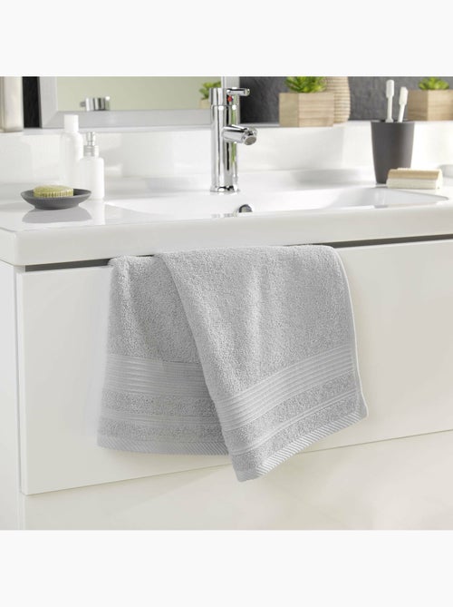 Serviette de toilette éponge unie tendresse - Kiabi