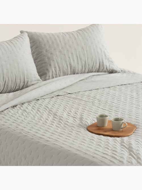 Set couvre-lit uni matelassé avec taie d’oreiller - Kiabi Set couvre-lit uni matelassé avec taie d’oreiller - Kiabi