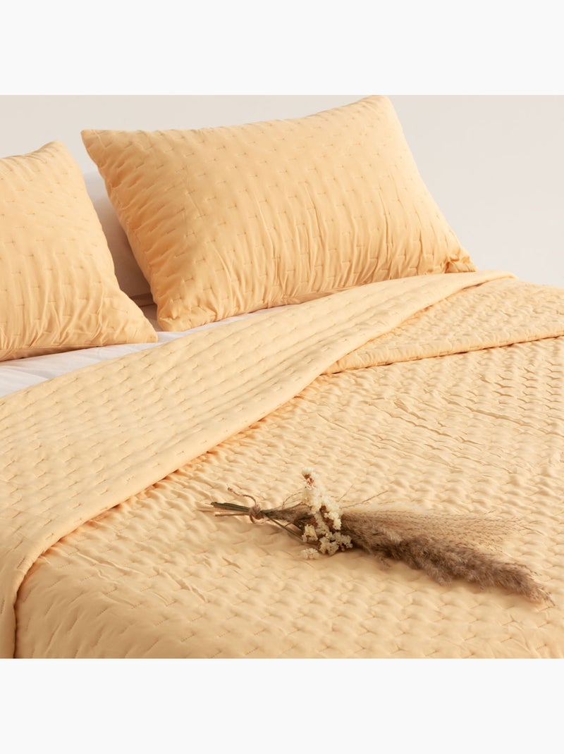 Set couvre-lit uni matelassé avec taie d’oreiller Jaune moutarde - Kiabi