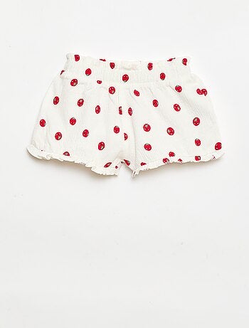 Short à motif avec base volantée