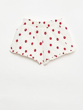 Short à motif avec base volantée