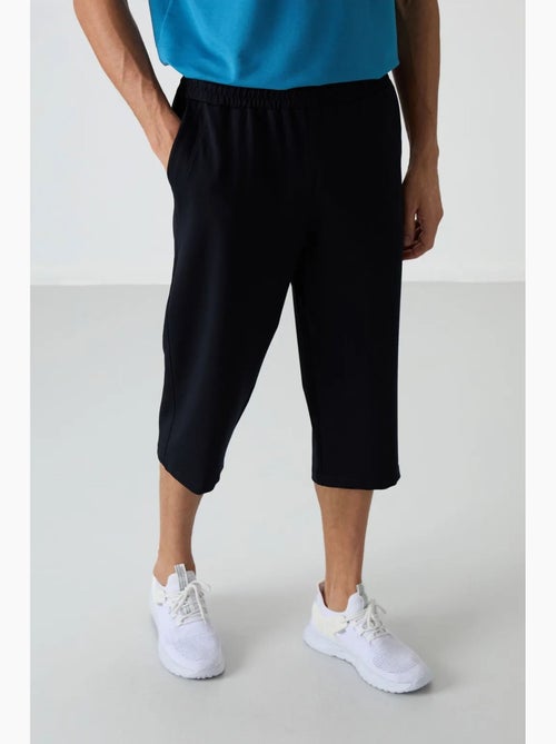 Short capri homme à taille mi-haute et jambe large tommy - Kiabi Short capri homme à taille mi-haute et jambe large tommy - Kiabi