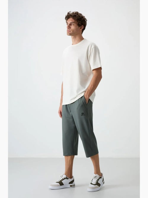 Short capri homme à taille mi-haute et jambe large tommy - Kiabi Short capri homme à taille mi-haute et jambe large tommy - Kiabi