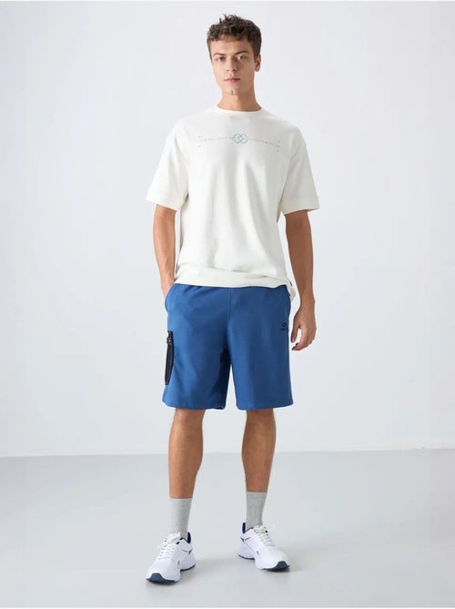 Short cargo homme à jambe large tommy - Kiabi Short cargo homme à jambe large tommy - Kiabi