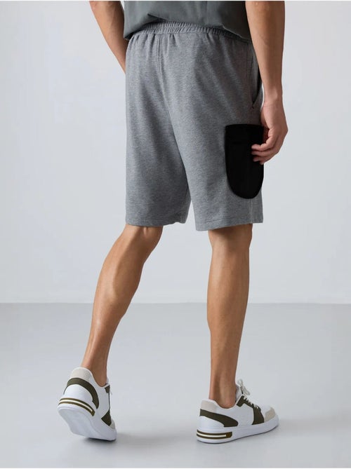 Short cargo homme à jambe large tommy - Kiabi Short cargo homme à jambe large tommy - Kiabi