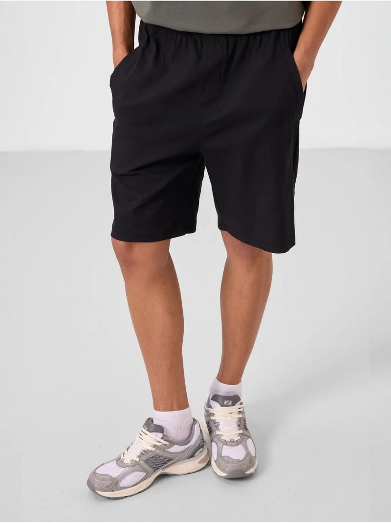 Short chino homme en tissu tissé tommy Noir - Kiabi