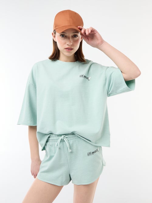 Short court en french terry avec inscription - Kiabi