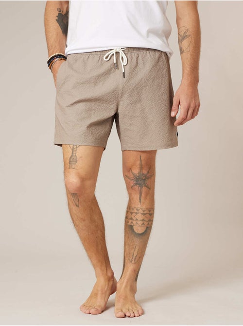 Short de bain homme uni texture gaufrée 'Deeluxe' - Kiabi