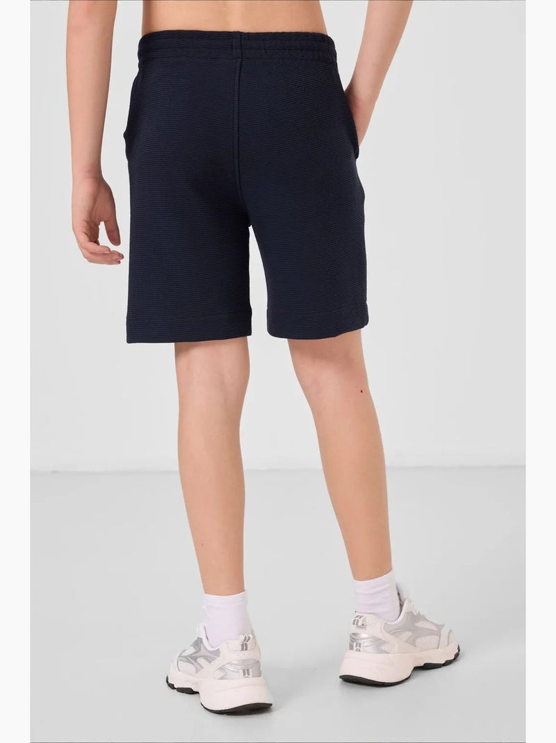 Short de jeunesse en coton mélangé tommy Bleu marine - Kiabi