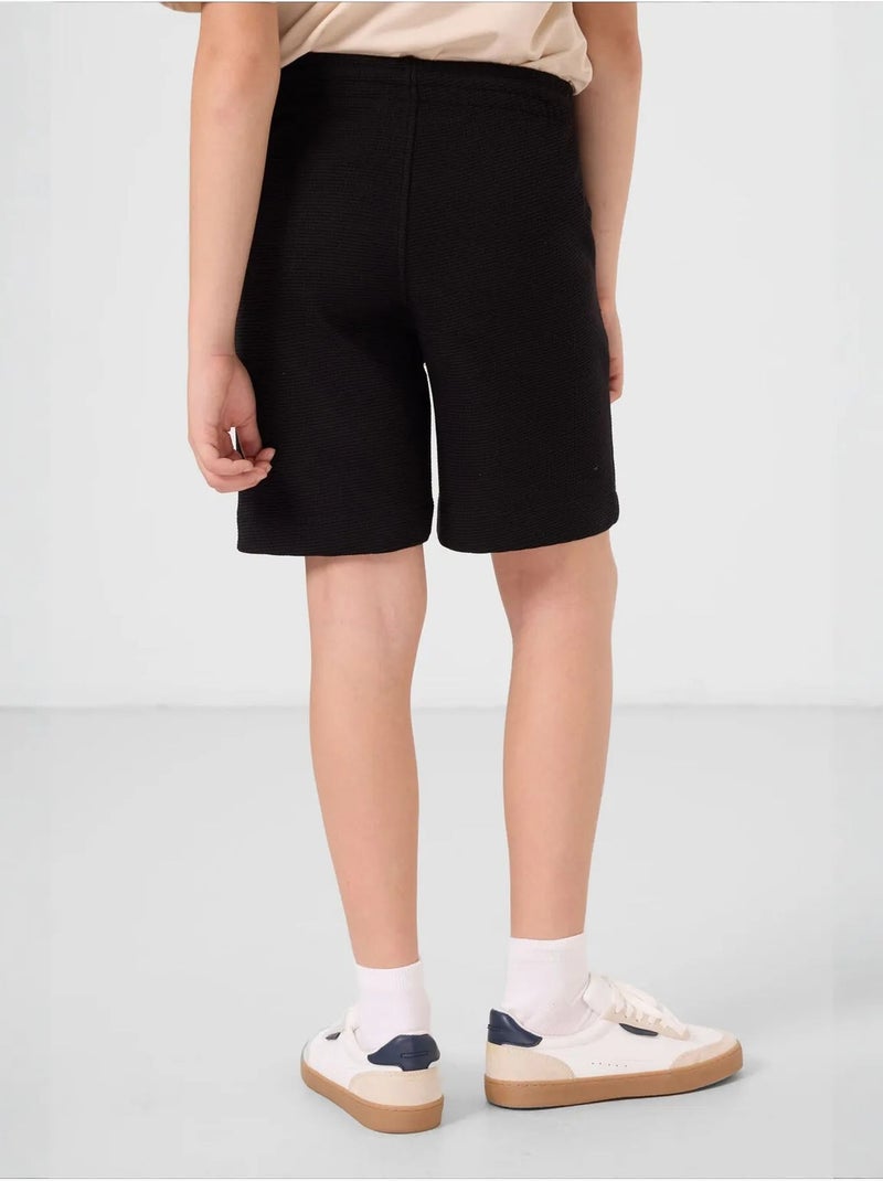 Short de jeunesse en coton mélangé tommy Noir - Kiabi