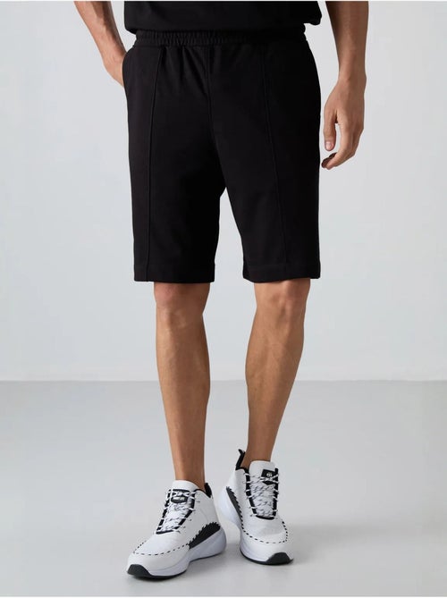Short de jogging homme en maille tommy - Kiabi Short de jogging homme en maille tommy - Kiabi