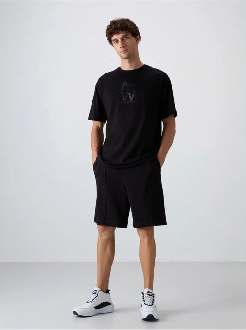 Short de jogging homme en maille tommy - Kiabi Short de jogging homme en maille tommy - Kiabi