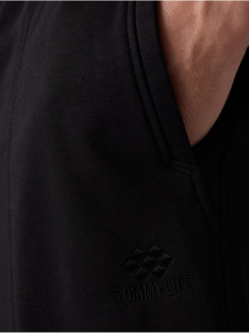 Short de jogging homme en maille tommy - Kiabi Short de jogging homme en maille tommy - Kiabi